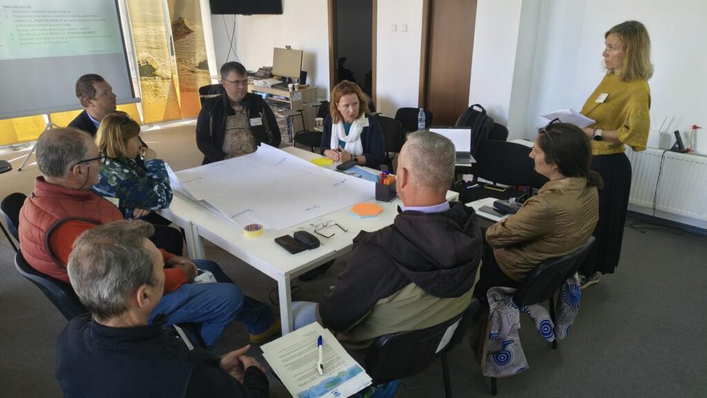 People around the table collaborating